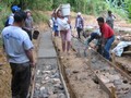 Community road construction in Latin America